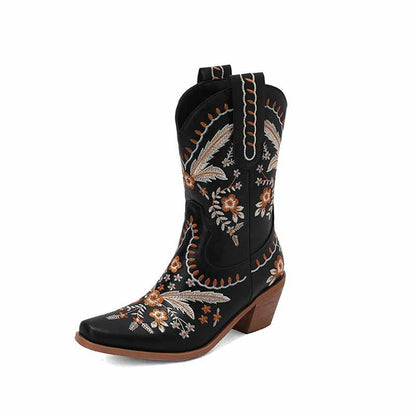 Stylish women's embroidered cowgirl boots in black with intricate floral designs and a chic heel