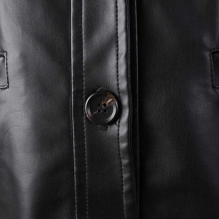Close-up of women's faux leather biker jacket featuring a stylish button detail