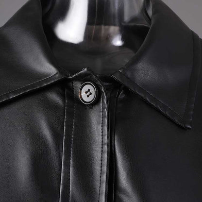 Close-up of women's faux leather biker jacket featuring a sleek design and button detail