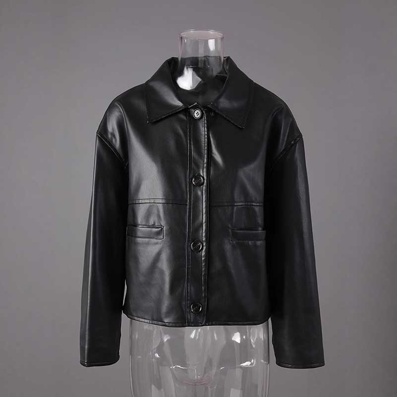 Women's faux leather biker jacket in black with a classic button-up design and sleek style