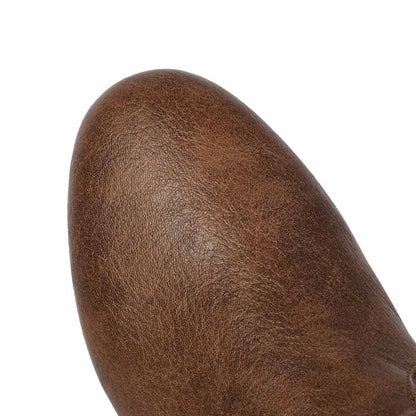 Close-up of women's faux leather flat boots in brown showcasing the textured design and sleek silhouette