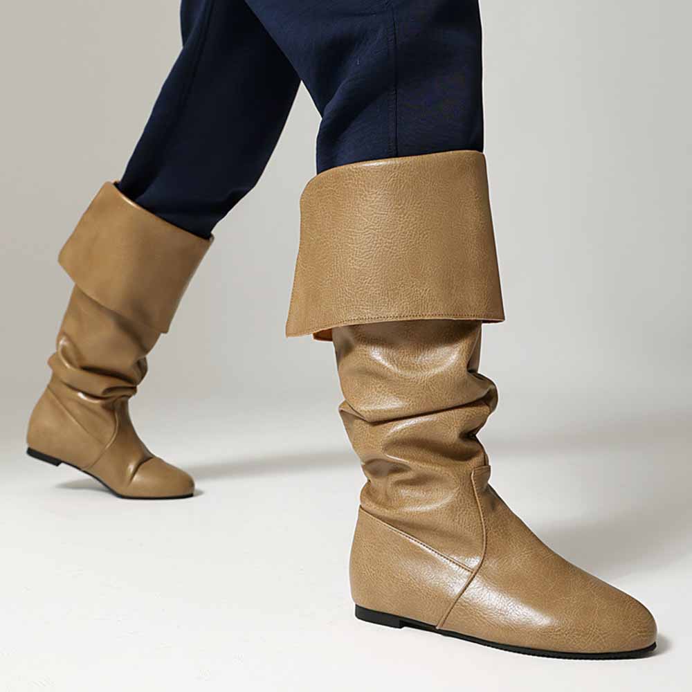 Stylish women's faux leather flat boots in tan with a slouchy design for a chic look