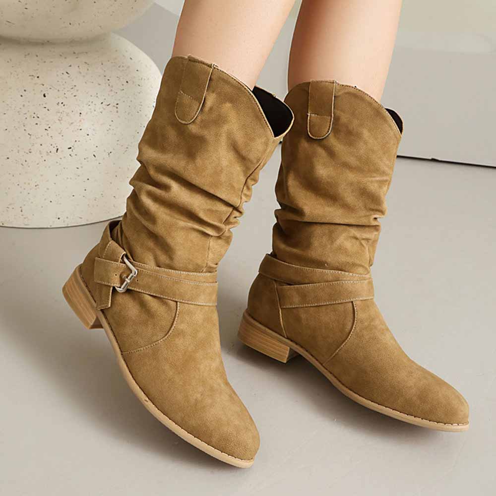 Stylish women's flat suede ankle boots in brown with a slouchy design and buckle detail