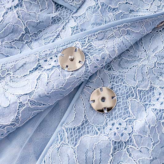 Light blue women's formal lace pantsuit for wedding with floral lace detailing and silver buttons