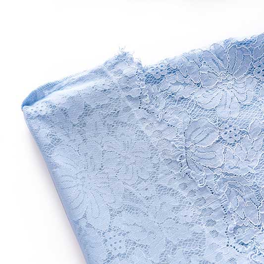 Elegant women's formal lace pantsuit for wedding in light blue with intricate lace detailing