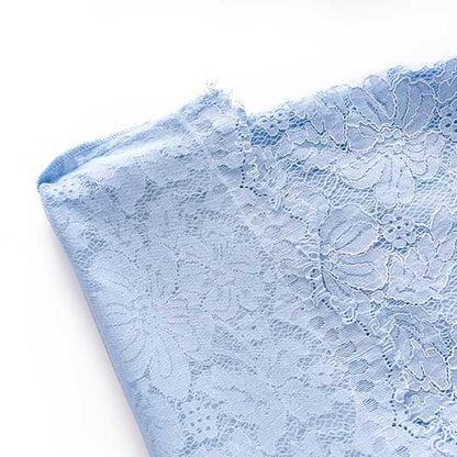 Elegant women's formal lace pantsuit for wedding in light blue with intricate lace detailing