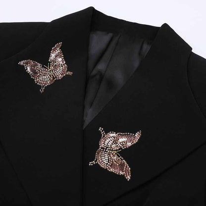 Elegant women's formal shorts set with intricate butterfly embellishments on the blazer collar