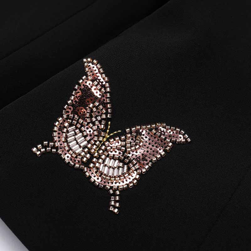 Women's single button formal shorts set featuring a sparkling butterfly embroidery detail