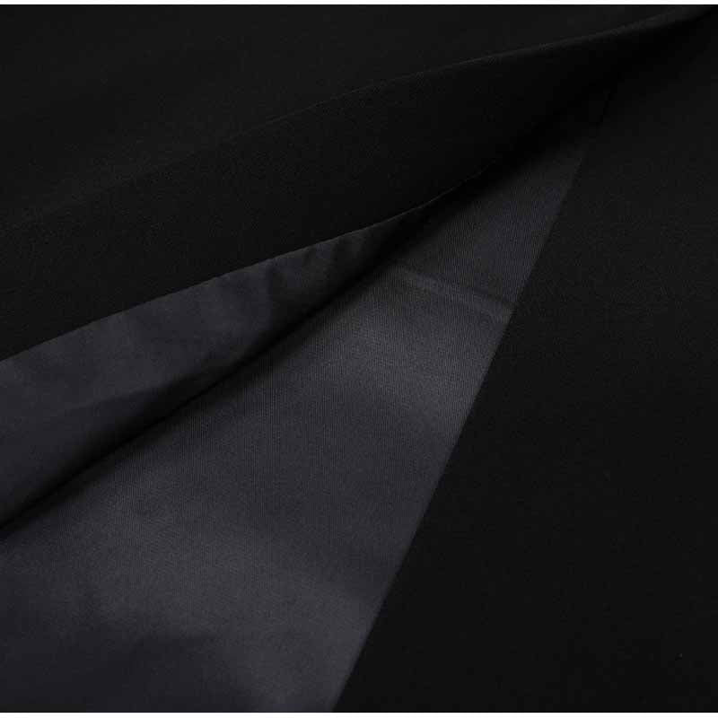 Close-up of SD Dresscode women's formal shorts set featuring a sleek black fabric with a smooth interior lining