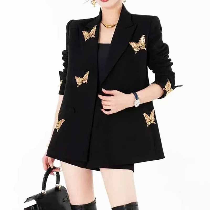 Elegant women's formal shorts set featuring a black blazer with butterfly embellishments
