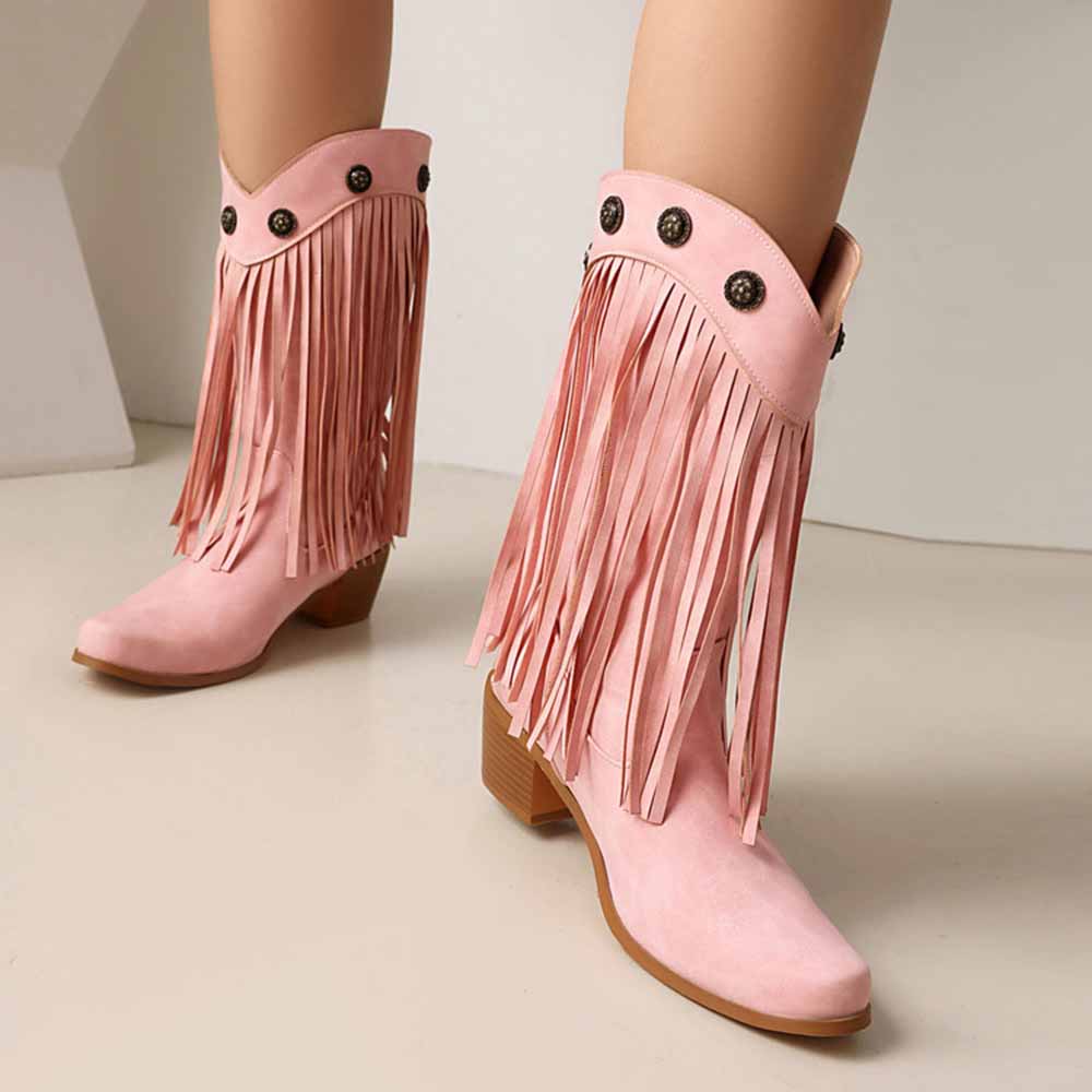 Stylish women's fringe cowgirl boots in pink with decorative buttons and a chunky heel