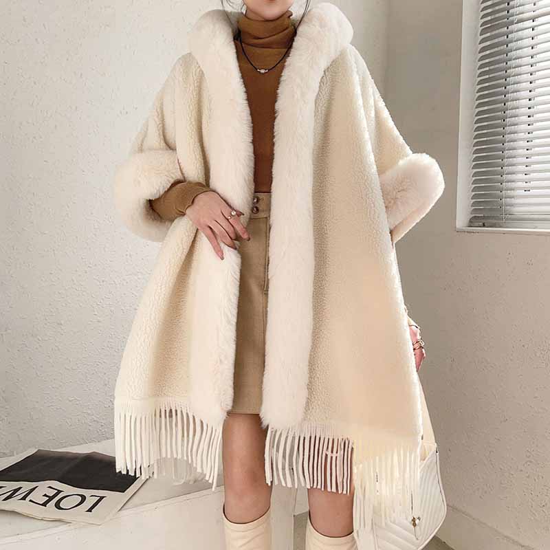 S&DCo. women's fur collar poncho in cream with fringe detailing for stylish warmth