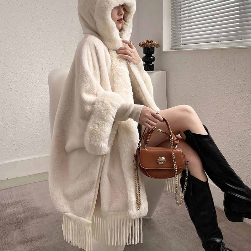 S&DCo. women's fur collar poncho in white with hood and fringed hem for cozy style