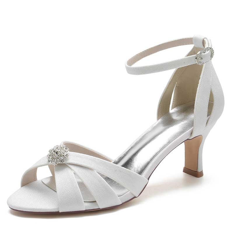 Elegant women's glitter ankle strap sandals in white with a jeweled embellishment and stylish design