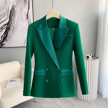 Stylish women's green pantsuit formal with a tailored double-breasted jacket for elegant occasions