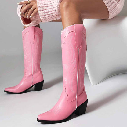 Stylish women's knee high western boots in pink with pointed toe and block heel