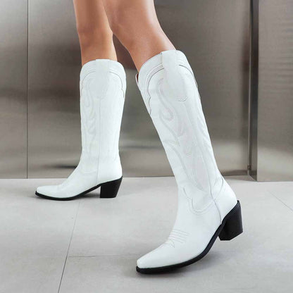 Stylish women's knee high western boots in white with detailed stitching and a low block heel