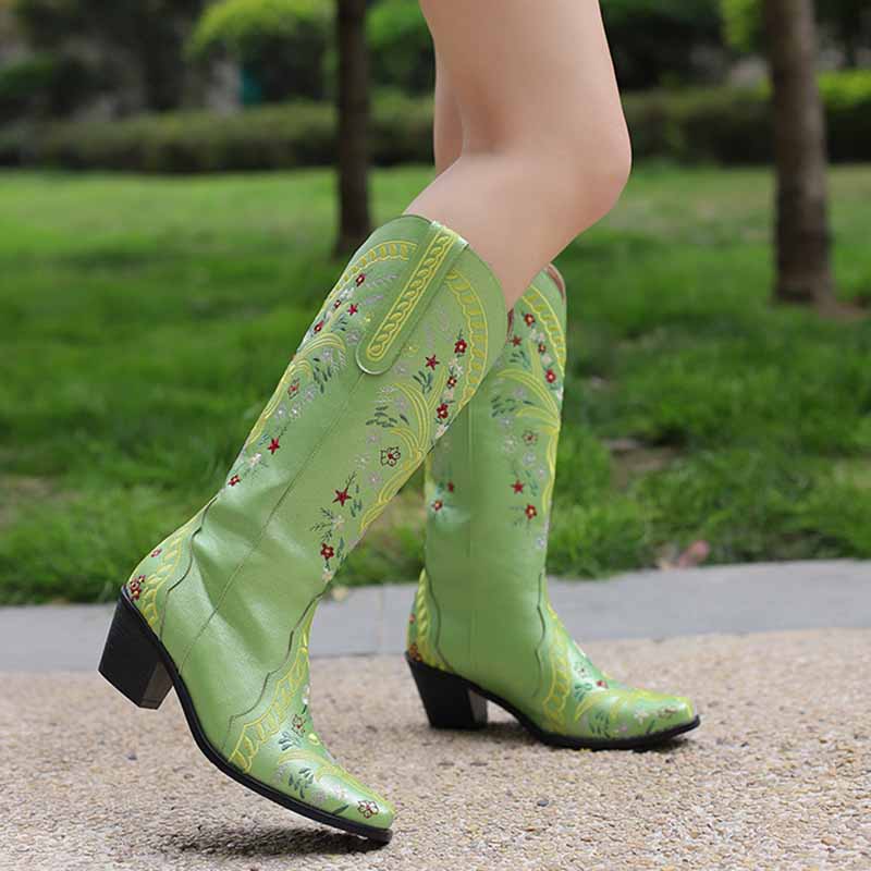 Stylish women's knee length cowgirl boots in green with floral embroidery for a trendy look
