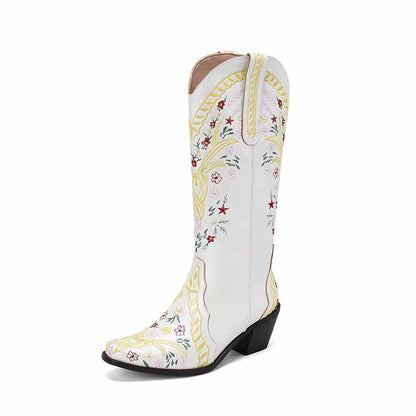 Stylish women's knee length cowgirl boots in white with colorful floral embroidery