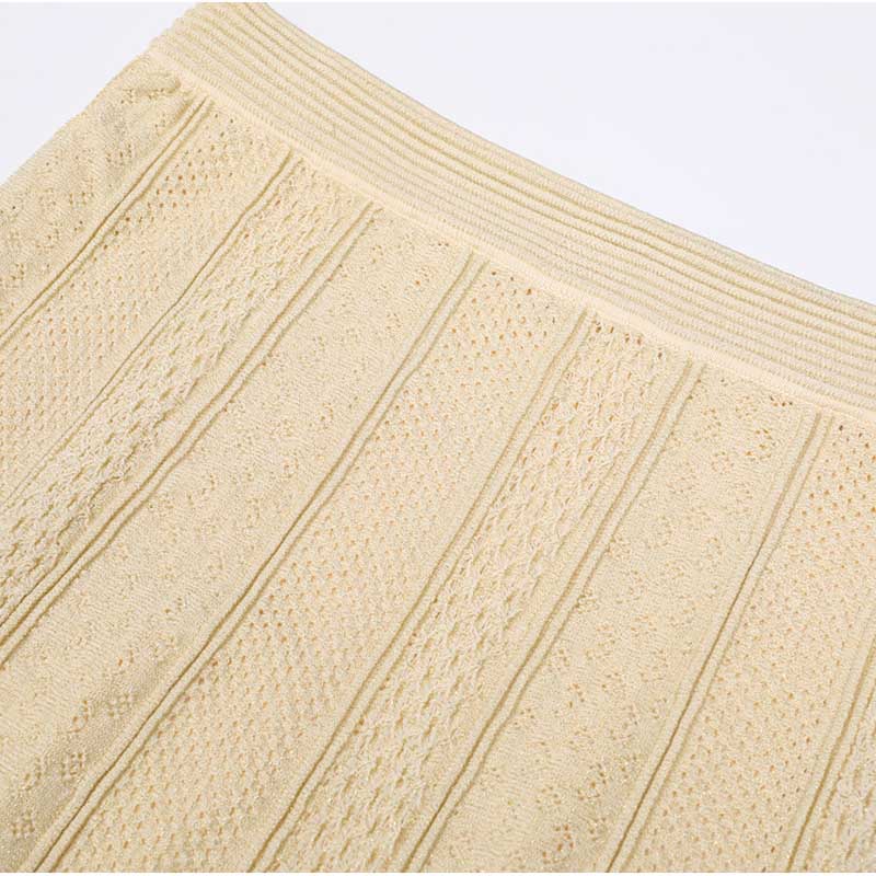 Elegant women's knit long skirt suit with textured detailing for stylish comfort