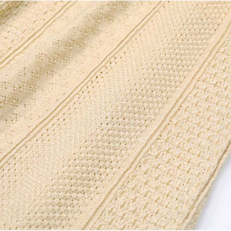 Women's knit long skirt suit in beige with textured fabric details for a stylish look