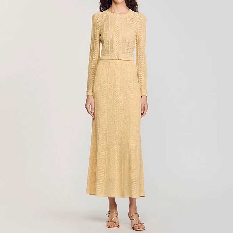 Elegant women's knit long skirt suit in soft yellow with long sleeves and a fitted waist design