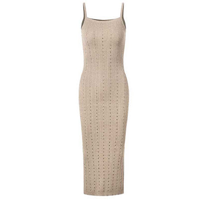 Women's knitted crop top and midi dress set in neutral color with a fitted design and spaghetti straps