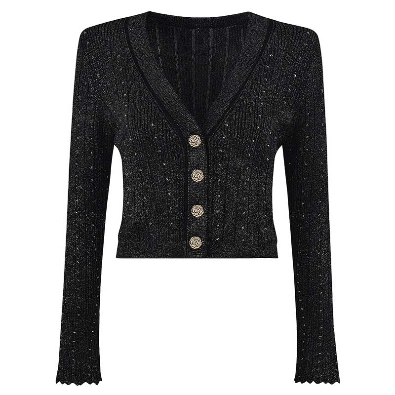 Women's knitted crop top and midi dress set featuring a black textured cardigan with button details