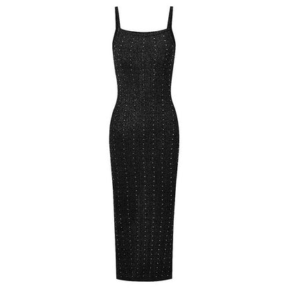 Elegant women's knitted crop top and midi dress set in black, perfect for casual outings or special occasions