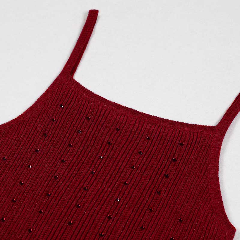 Elegant women's knitted crop top and midi dress set in rich burgundy with a stylish ribbed design