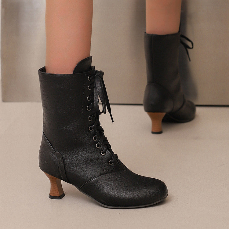 Stylish women's lace-up ankle boots with a block heel and sleek black design