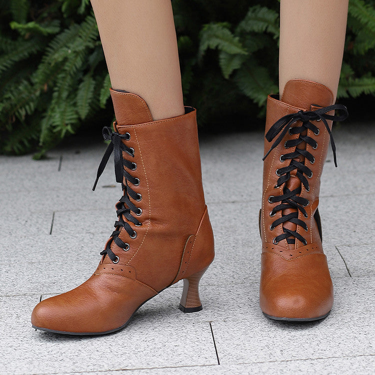 Stylish women's lace-up ankle boots in brown featuring a chic heel and black laces