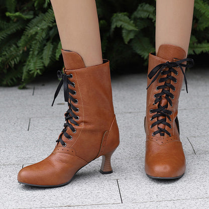 Stylish women's lace-up ankle boots in brown featuring a chic heel and black laces