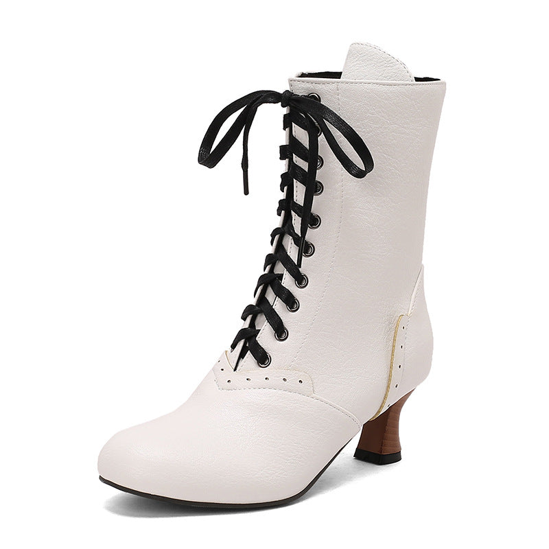 Stylish women's lace-up ankle boots in white with black laces and a modest heel