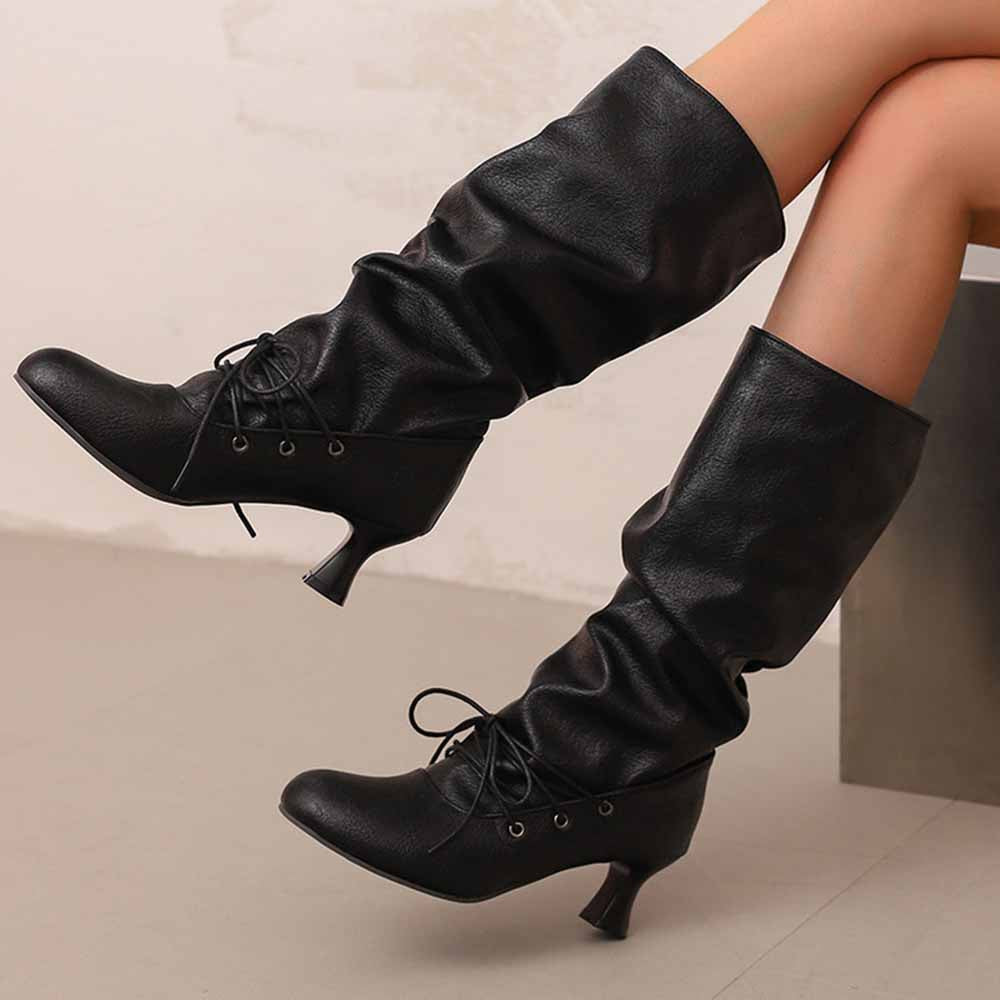 Stylish women's lace-up high shaft boots in black leather with a chic heel design