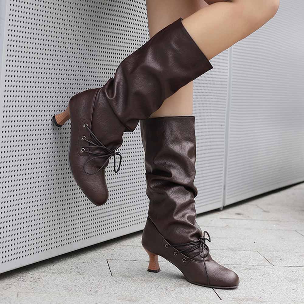 Stylish women's lace-up high shaft boots in brown with a chic design and comfortable heel