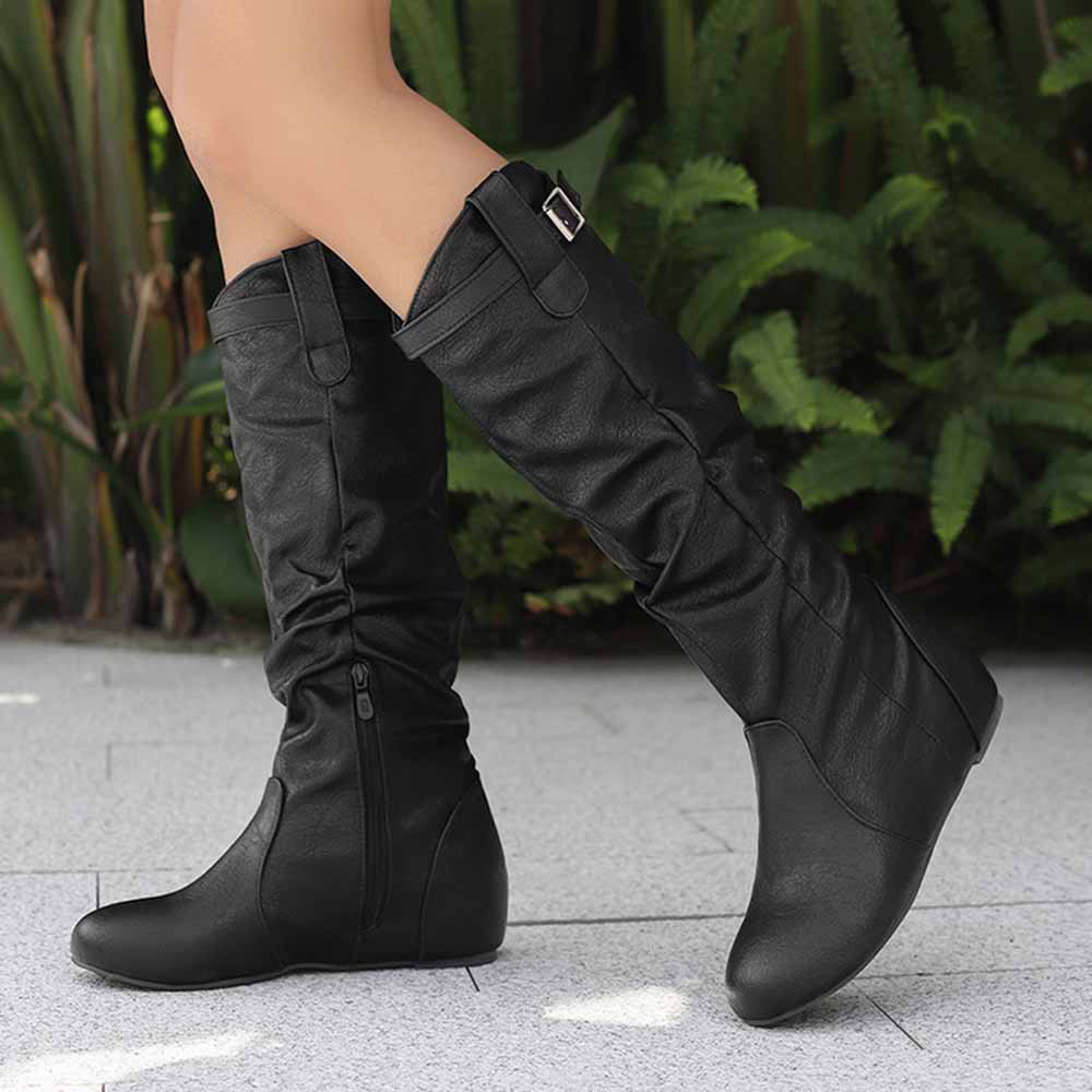 Stylish women's lace-up wedge boots in black with a modern slouch design and side zipper
