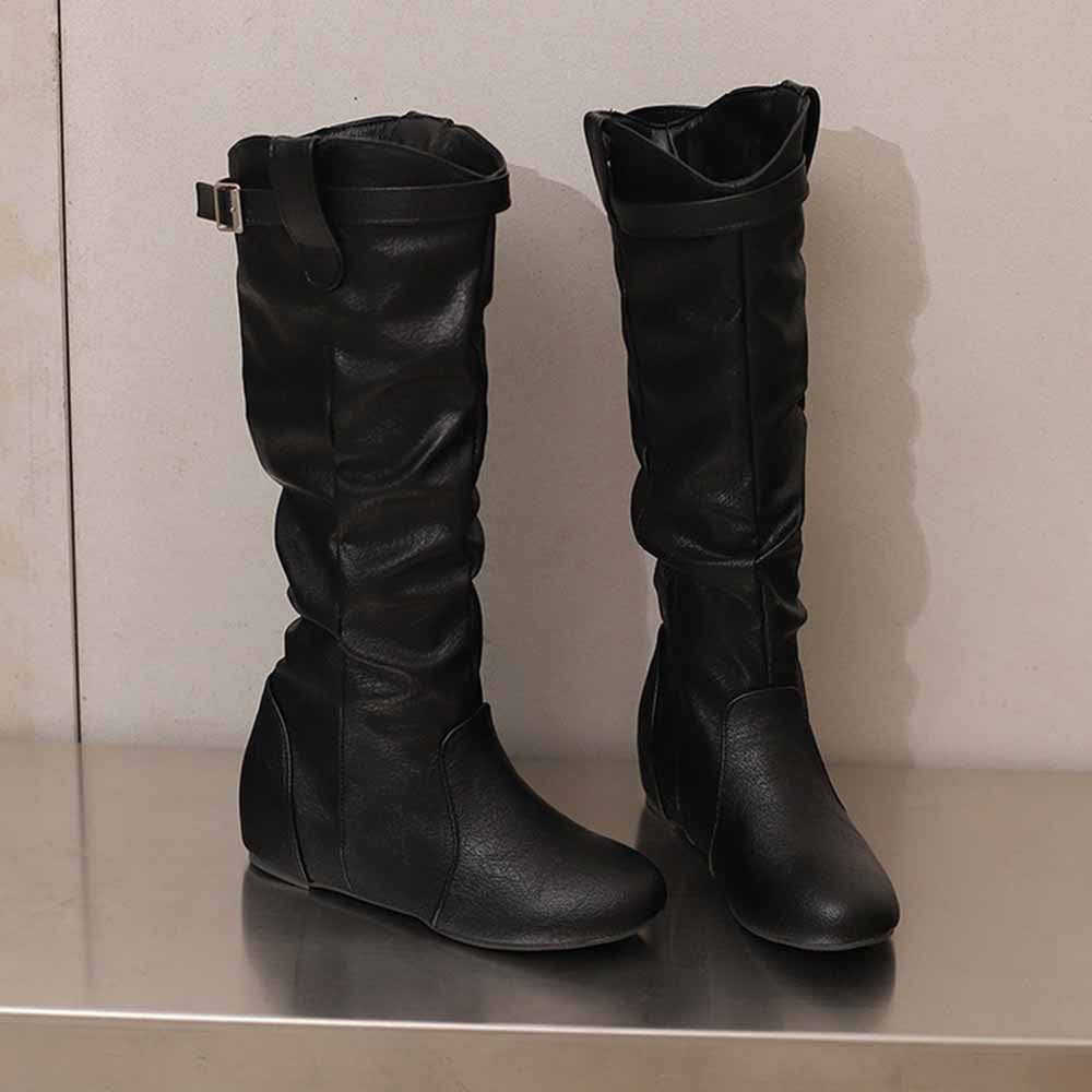 Stylish women's lace-up wedge boots in black with slouchy design and ankle strap