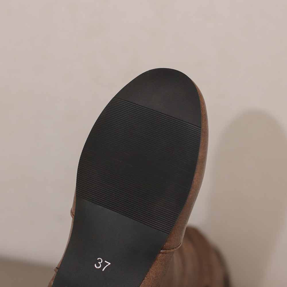 Bottom view of sd-hk women's lace-up wedge boots displaying textured outsole for grip and stability