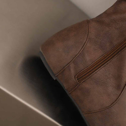 Close-up of sd-hk women's lace-up wedge boots in brown leather with side zipper detail