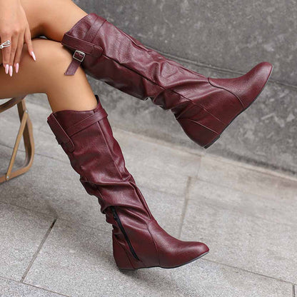 Stylish women's lace-up wedge boots in burgundy with a sleek design and comfortable fit