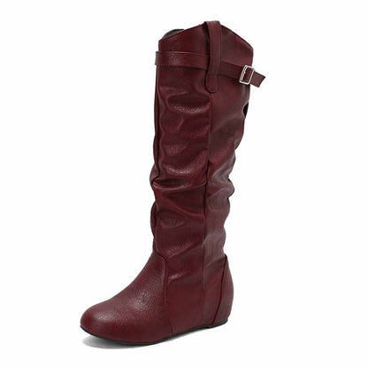 Burgundy women's lace-up wedge boots with slouchy design and buckle detail for stylish winter wear