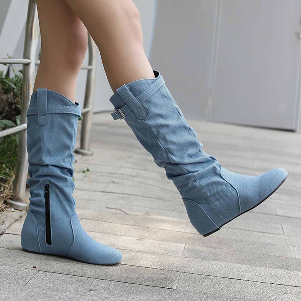 Stylish women's lace-up wedge boots in blue with a slouchy design and modern zippers