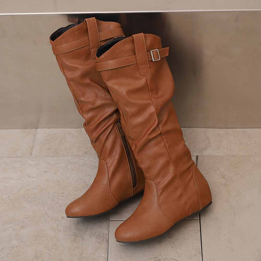 Stylish tan women's lace-up wedge boots with a zipper and buckle detail for added flair