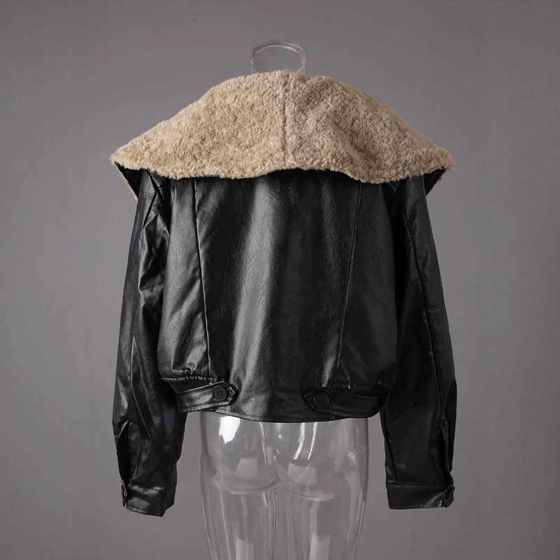 Women's leather effect jacket with shearling collar featuring a stylish oversized design