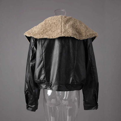 Women's leather effect jacket with shearling collar featuring a stylish oversized design