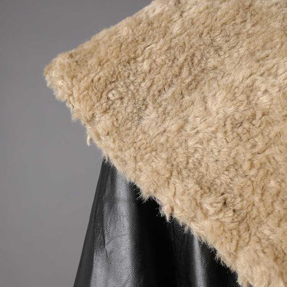 Women's leather effect jacket with shearling collar showcasing soft texture and stylish design