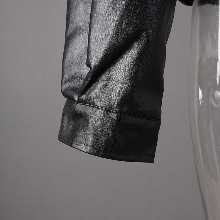 Close-up of women's leather effect jacket with shearling collar showcasing high-quality material and stylish design