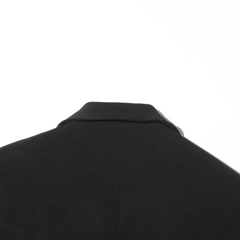 Back view of a women's maxi blazer coat by sd-hk, featuring a sleek design and tailored finish.