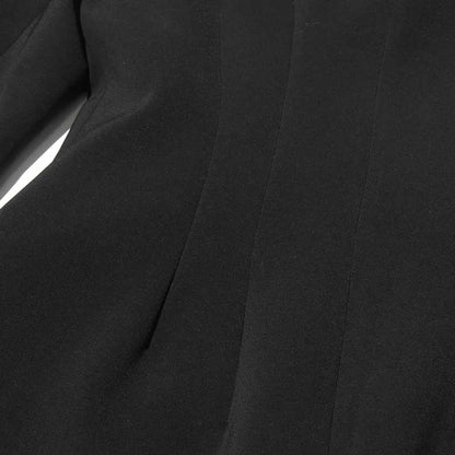 Stylish women's maxi blazer coat in black with a tailored fit for a chic look